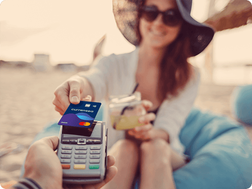 Use a Currensea travel money card on a beach