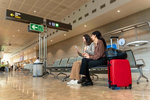 two-international-businesswomen-waiting-at-the-air-2025-03-10-13-08-21-utc-min